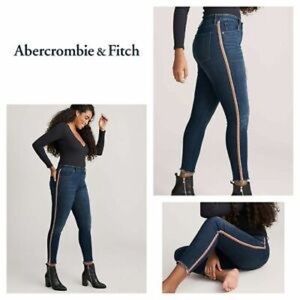 High rise ankle skinny jeans with red stripe